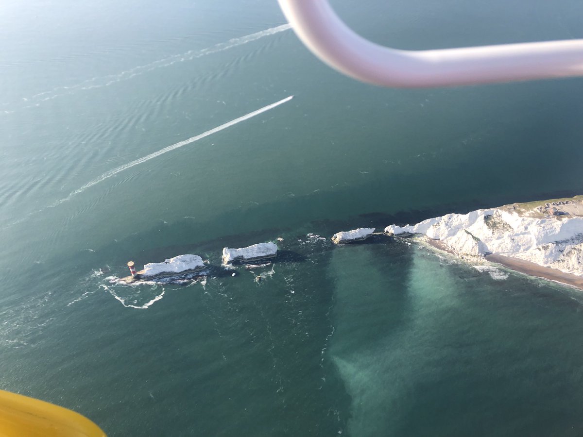 GeoffreyCoan's tweet photo. No trip to the #IsleOfWight would be complete without seeing #TheNeedles.  For the first time I circumnavigated the entire island before heading back across the #solent to Portsmouth and #SpinnakerTower. Great weekend away #flexwing #microlight #flying https://t.co/XlPWi5rhq2