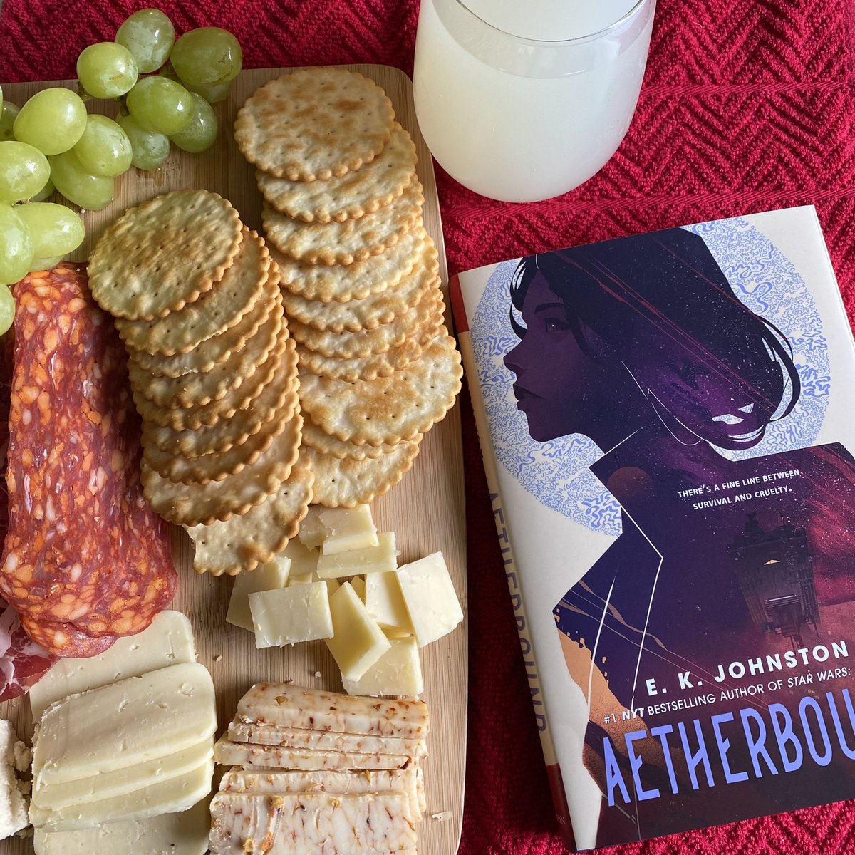 psunshine87's tweet photo. It is my understanding that cheese is a required part of reading #Aetherbound by @ek_johnston https://t.co/uNSAX6JWue