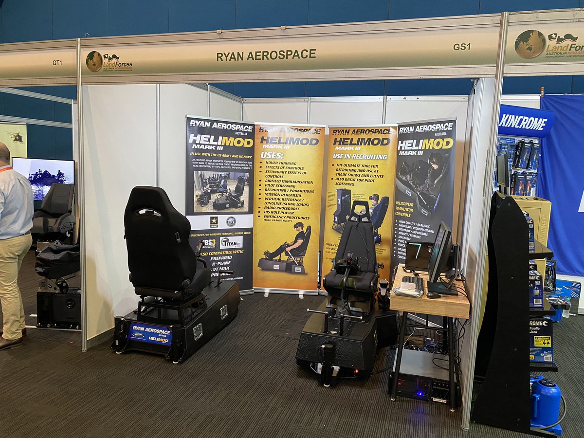 RyanAerospace's tweet photo. All set up for Land Forces. Drop by and see our linked, multi-ship Apache AH-64E demo for mission rehearsal and combined arms training exercises in action. Site GS1 in the Grand Hall. #ryanaerospace #sasimulations #boeingdefenceaustralia #bohemiainteractive #dbox https://t.co/x9XNG0CHMO