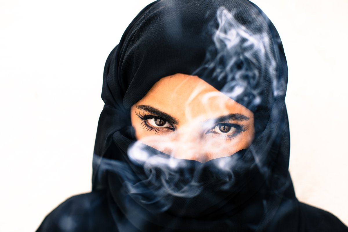 #Saudi woman #niqab #incense #SaudiArabia sebastianfarmborough.com