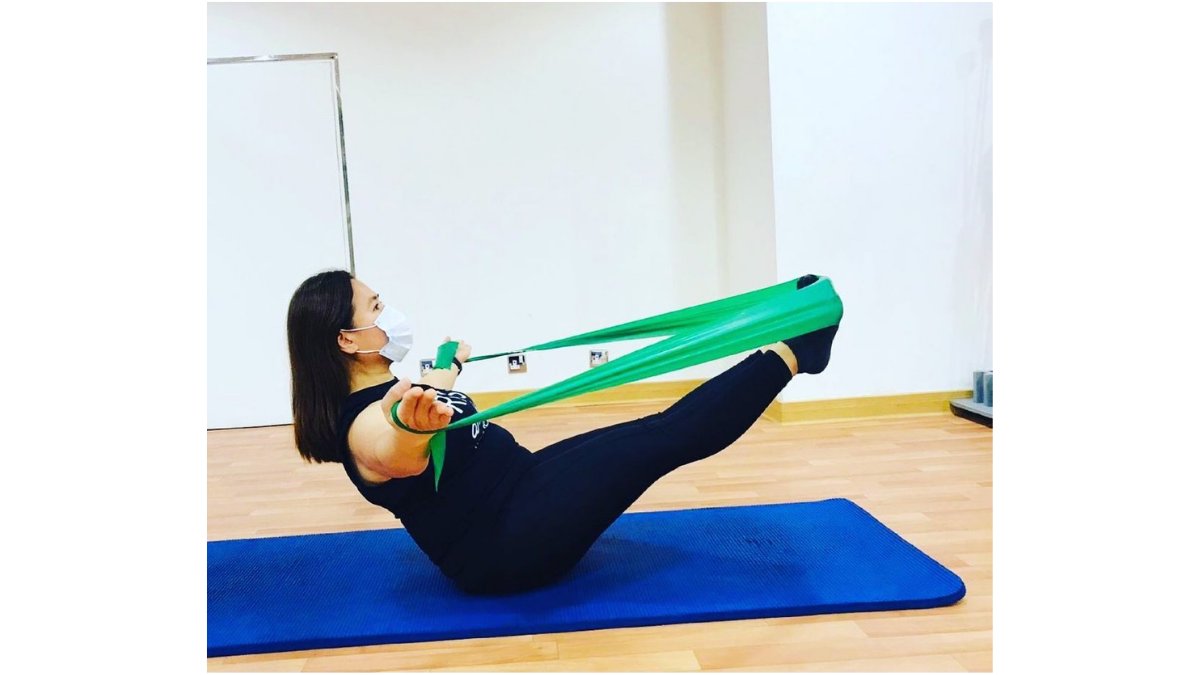 STOTT_PILATES's tweet photo. STOTT PILATES® Certified Instructor Mariz uses the Flex-Band® for added assistance during her #PilatesTeaser. What a great modification! Thanks Pilates &amp; More for sharing. https://t.co/Kvw7g8KCui