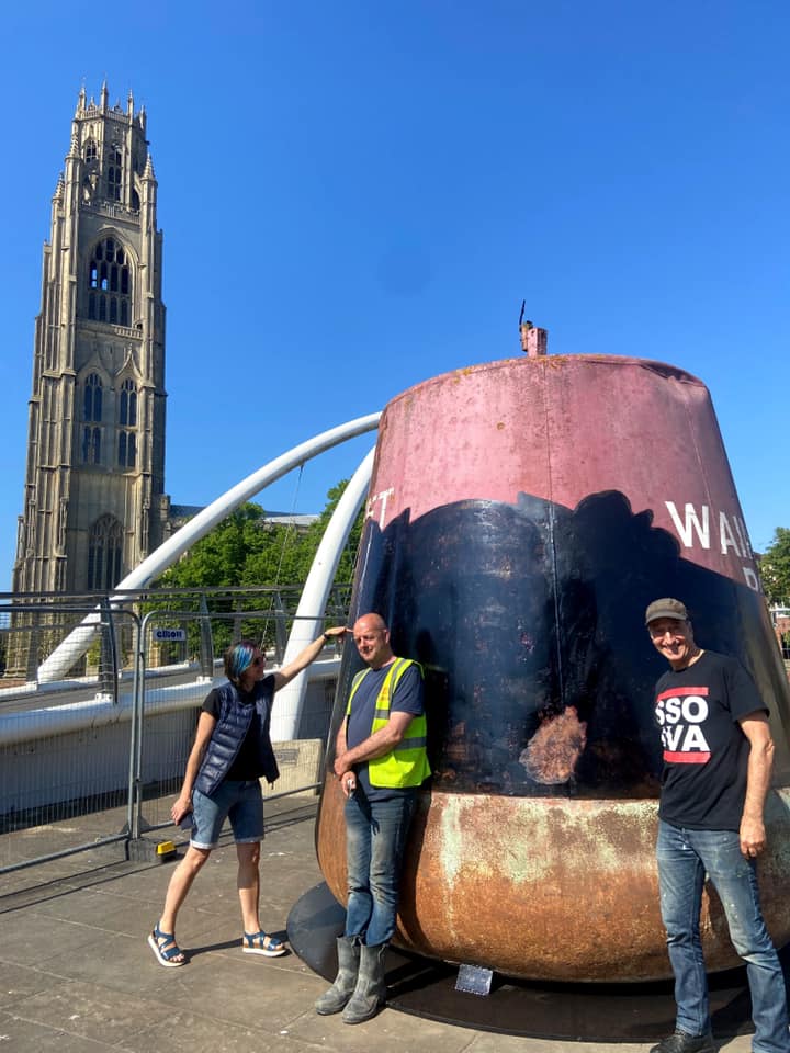 TransportedArt's tweet photo. @carriereichardt and her team are here in Boston! 

The mosaics are being put on two of the buoys. Here's the work being done today on the buoy at St Botolph's footbridge. https://t.co/4VgkuVdC2W