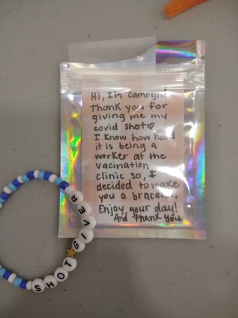 HealthNS's tweet image. Camryn, age 12, received her #COVID19 vaccine at the Yarmouth Community Vaccine Clinic and surprised her immunizer with a note and gift. She wanted to show her appreciation to the health care workers who have been working hard. Book your vaccine: novascotia.ca/coronavirus/bo…