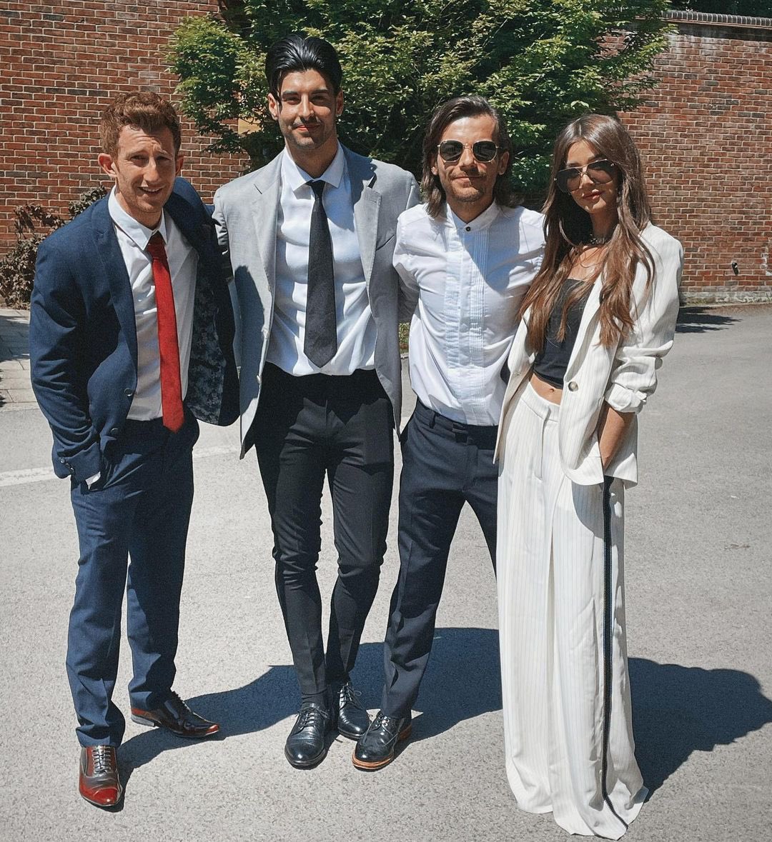 📸| Louis at the wedding this past weekend!