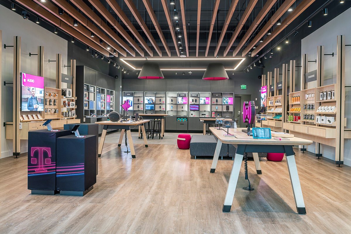 JonFreier's tweet photo. When you find yourself in the heart of Denver, Colorado’s iconic LoDo District, this new @TMobile store is sure to catch your eye! Such a fantastic spot right down by Union Station and the ballpark. Check out that magenta glow! 😍 https://t.co/nWqTm0m8Sm