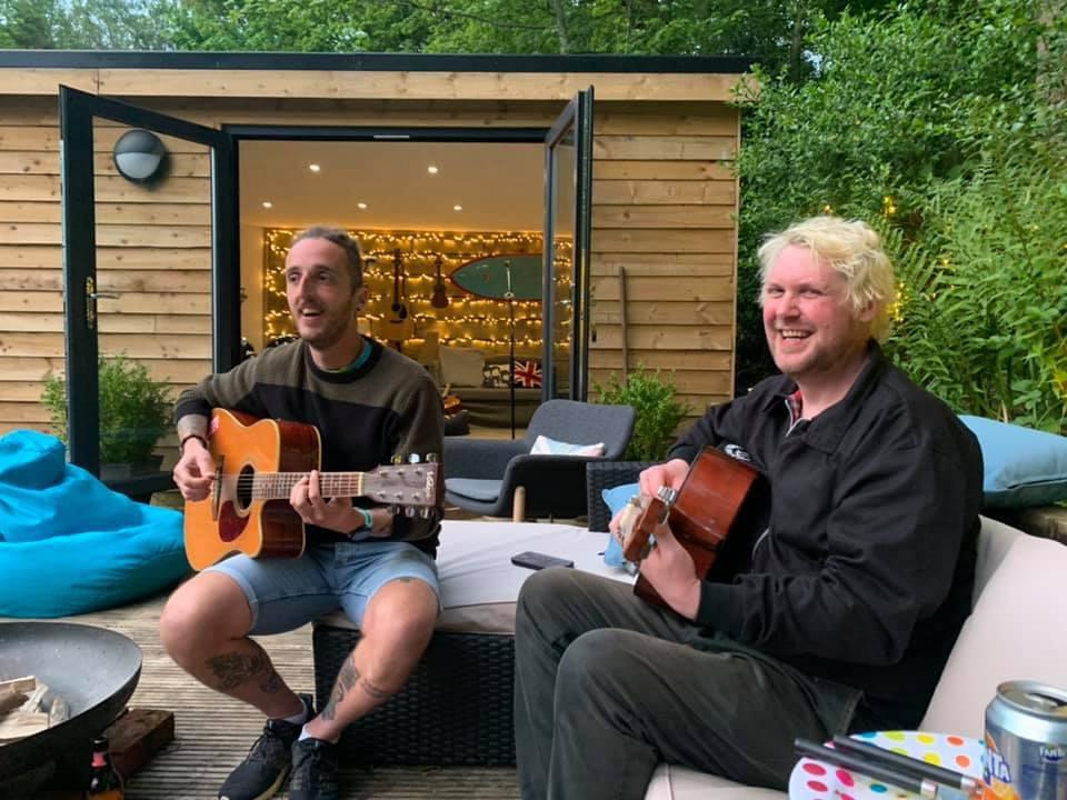 miketvupdates's tweet photo. Jhon &amp; Domb here! 

We played a little acoustic garden gig on Friday (thanks Simon &amp; fam for having us) and it was really fun and we got paid in sausages which was also fun / apt. 

Playing music again is making us both really happy! https://t.co/Nw0pVIXqWp