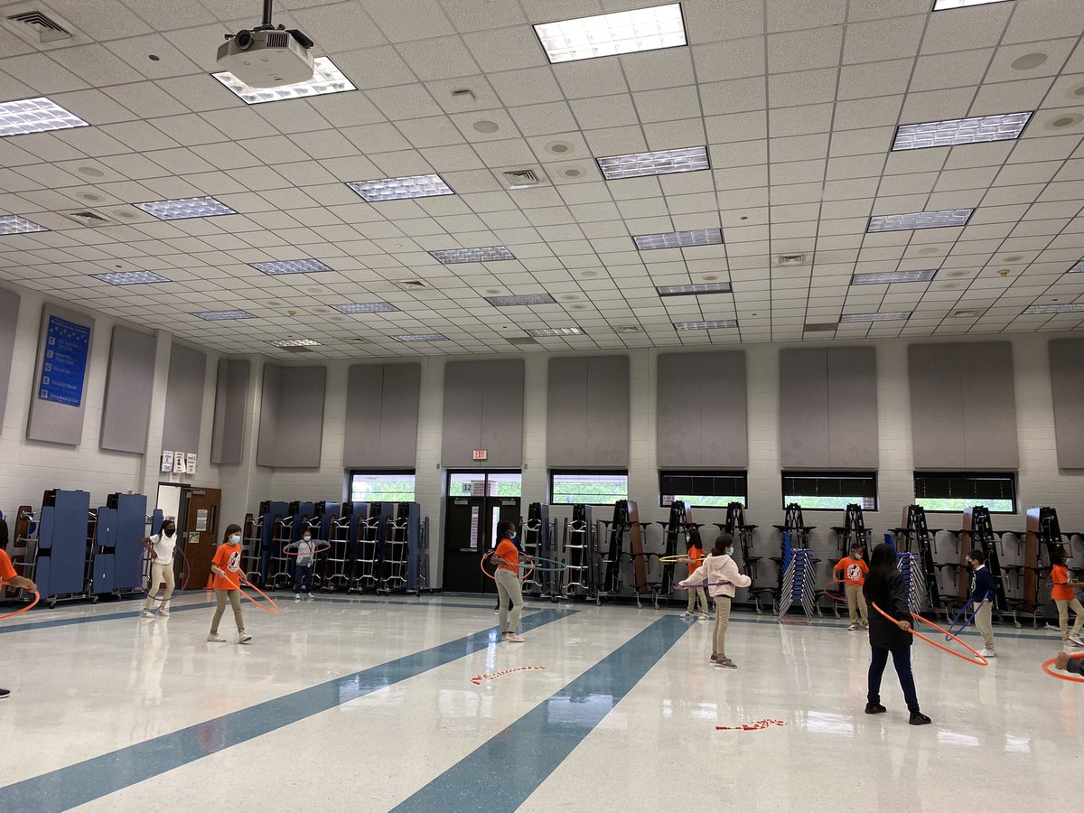 PrincipalCClark's tweet photo. After missing Field Day last year due to COVID, I was determined to not let the rain stop our @KlentzmanTigers this year. #SocialDistancing #fieldday #insideevents Who will be the hula hoop champion? https://t.co/espTkV8GNh