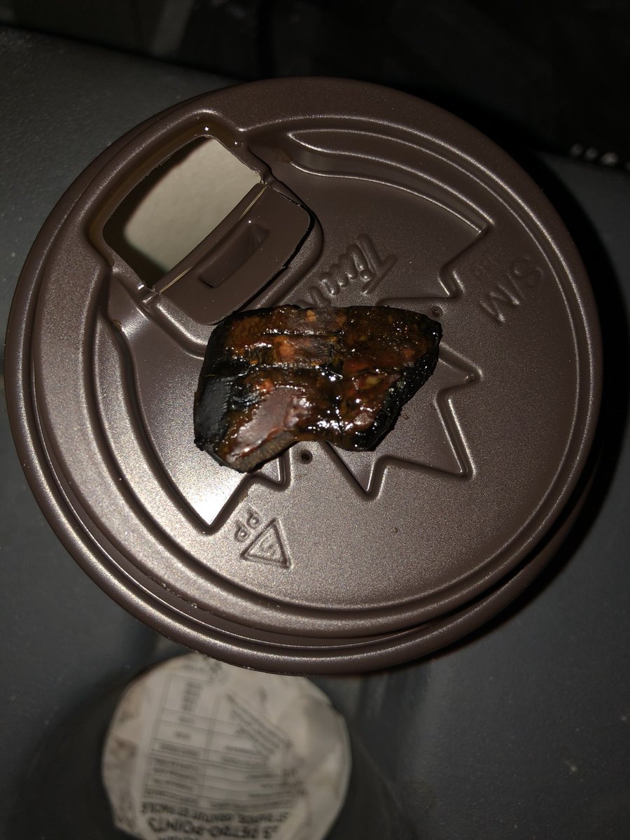 RadioJillian's tweet photo. @MaynardsCandy My fiancé just bit into this in his bag of sour patch kids as we drove home in the dark.  WTF is this?!  It is ROCK HARD and has a gross brown residue. 🤢🤢 I want to puke right now. https://t.co/BIQTQ8AiPc