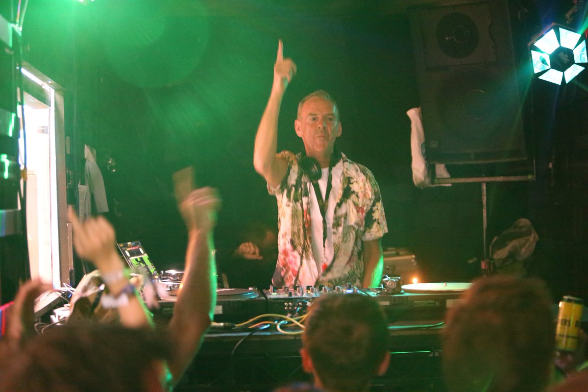 .<a href="/FatboySlim/">Fatboy Slim</a> in a shipping container kinda day #GlastoPhotoOfTheDay