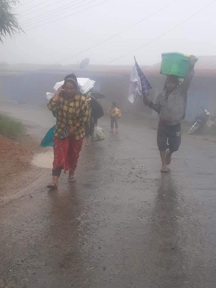 NaingSitThway's tweet photo. #Chin State A #refugee from #Mindat move in the rain and wind without help. #HelpMindat #SaveMindat #June14Coup #WhatsHappeningInMyanmar https://t.co/BuNFzxCCRt