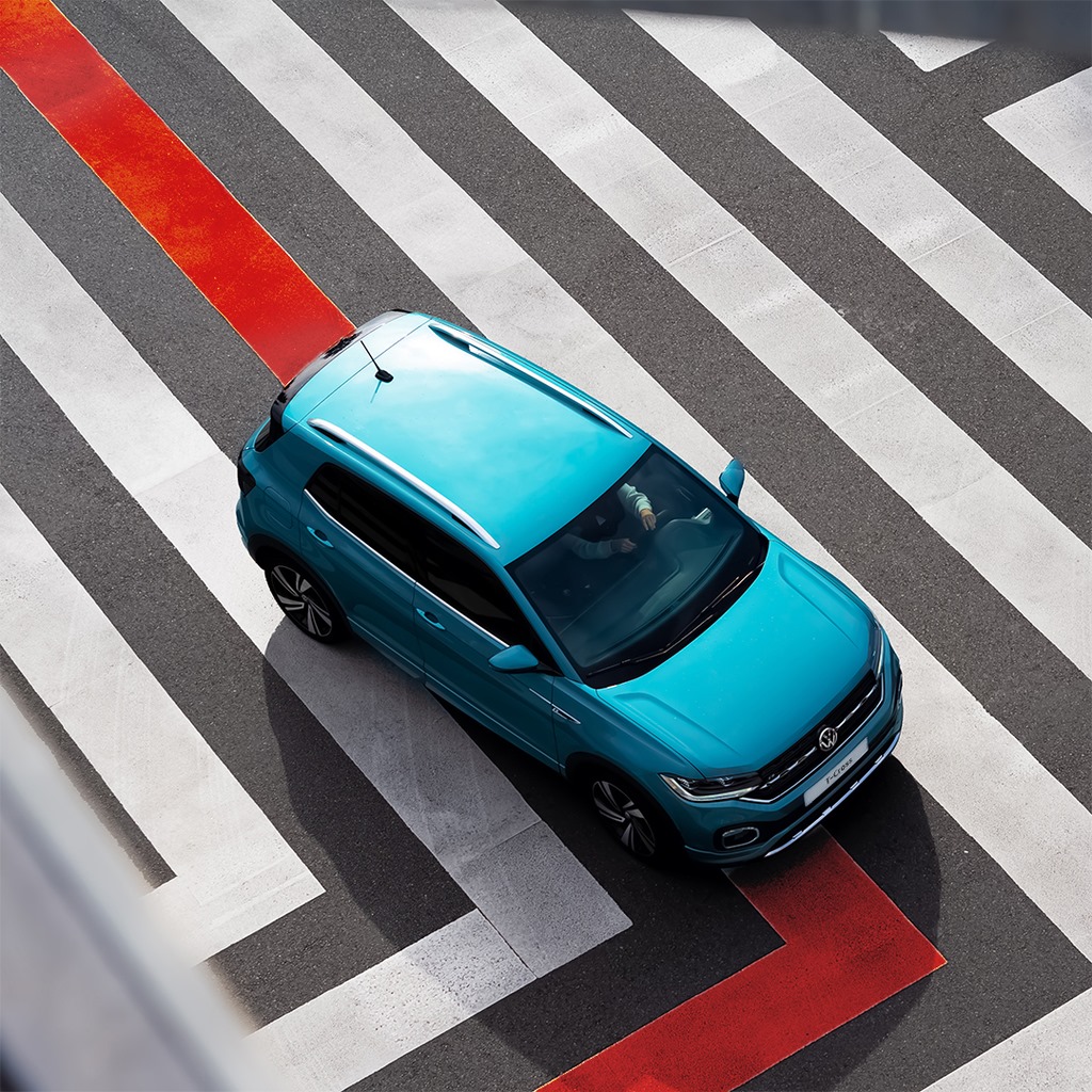 The Volkswagen T-Cross. Where design meets adventure.
With an exterior that’s funky and fun, and an interior that’s spacious, clever and packed with features.

Available now, from £18,655

Discover more: bit.ly/31OonHP