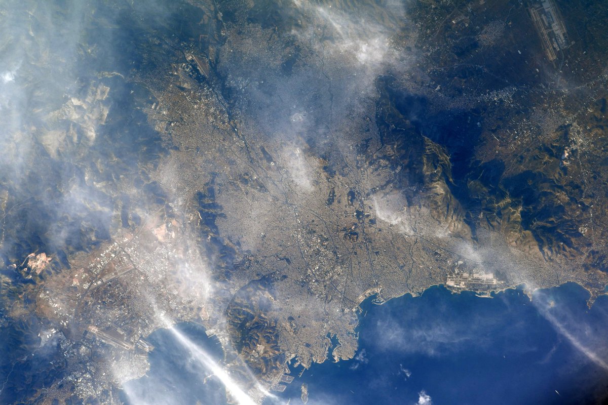 Beautiful Athens, Greece is under a few clouds today. I can still spot 4 airports in this photo. Can you find them? I also spotted Karaiskakis Stadium near the Athens Marina.