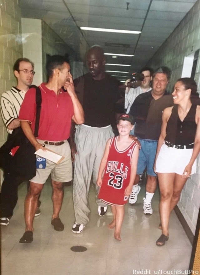 Rare pic of a kid barefoot with Michael Jordan because he refused to be in a picture with a someone wearing Reeboks