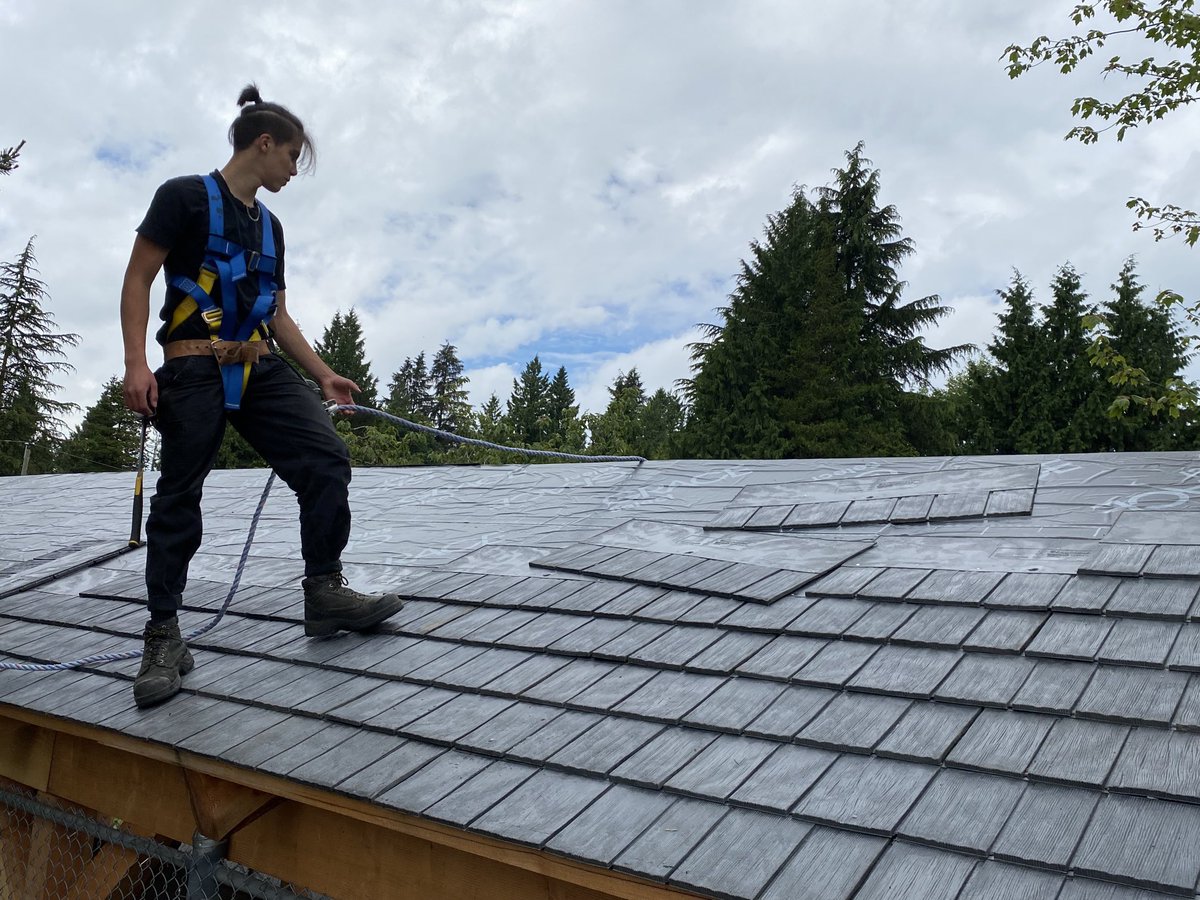 WVSS Carpentry finishing the canoe roof. Installing shingles made from recycled tires. Looks great! Thanks Penfolds Roofing
