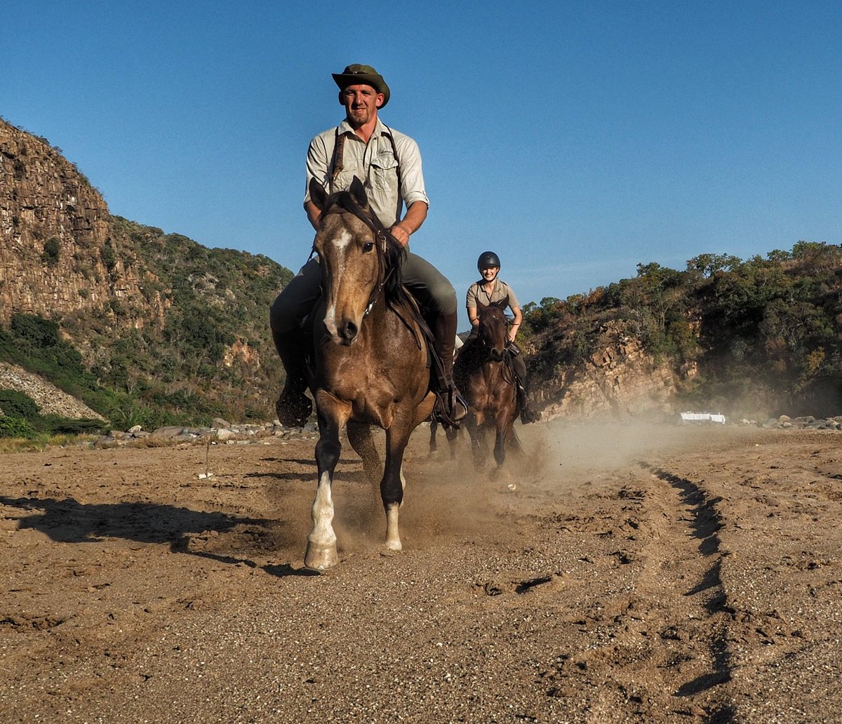 A beach in the bush? 
The sandy shore of the White Umfolozi River in the Babanango Game Reserve is a beaut spot for a roaring fire and sundowners after a horse trail in the bush. #HorseSafari