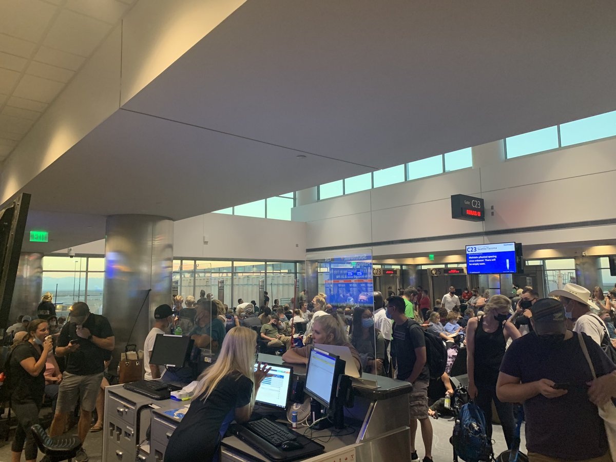 LoriBuff's tweet photo. The @SouthwestAir terminal in Denver.  Packed like sardines. Hate it for us, the employees/gate agents/crew, and the folks at HQ.  What a mess for everyone. https://t.co/HezdTsqRud