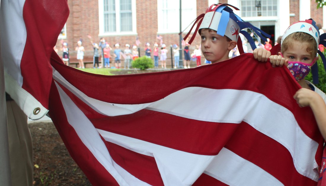KLSchools's tweet photo. "I pledge allegiance to the flag ... " While students say the Pledge of Allegiance each day, reciting it together at the KES kindergarten celebration of #FlagDay was impactful, memorable and moving. Students also helped SRO & veteran Paul Black hoist the flag. #KLActiveLearning https://t.co/CgQCVQF5i8