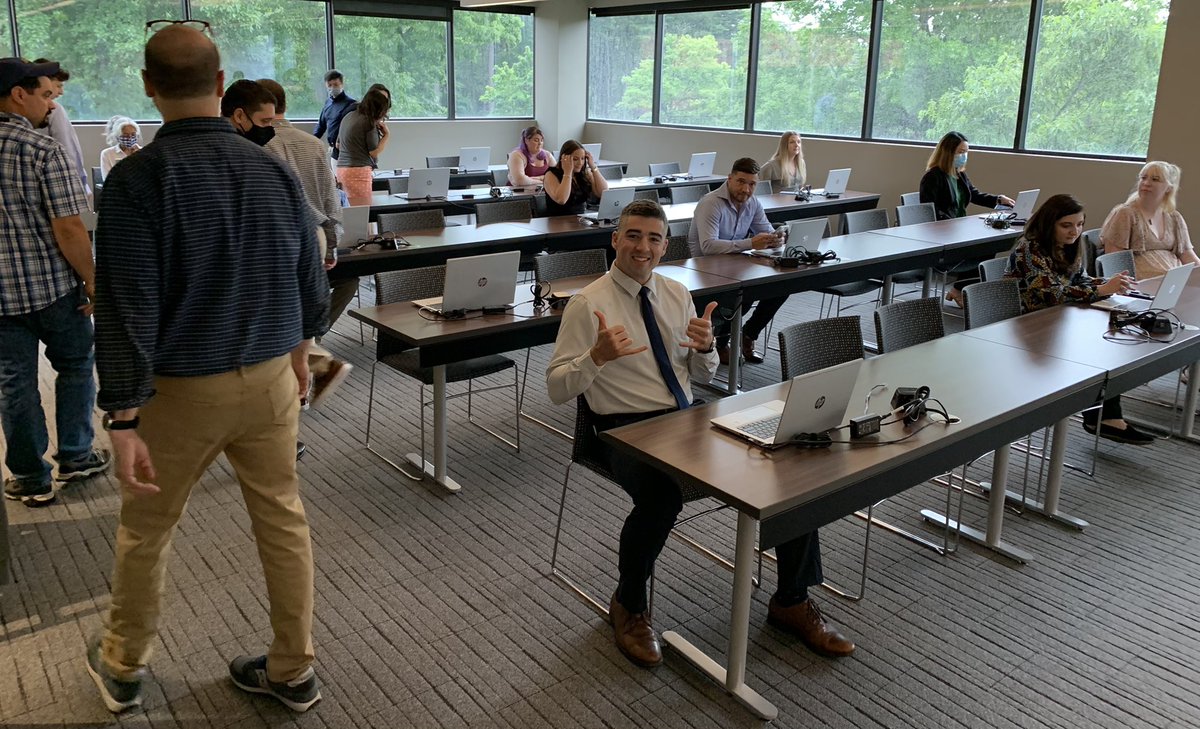 MEDITECHCareers's tweet photo. A scene from today’s New Hire Orientation! John’s giving us a thumbs-up while receiving his laptop! 45 new staff members joined the MEDITECH family today! #MEDITECHers #Orientation https://t.co/M04KKh7oKl