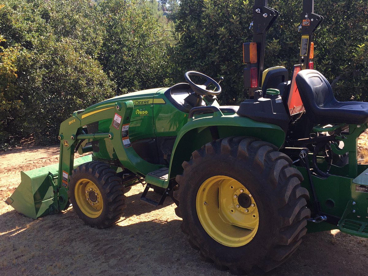 brettwatermantv's tweet photo. It might seem like overkill to use a backhoe to plant a small 15 gallon tree, but my tractor made the work easier this last weekend!  Redlands has a very high clay content in our soil, hence the city name “Redlands” based on all our red clay soil. https://t.co/3lRqqSyjXs