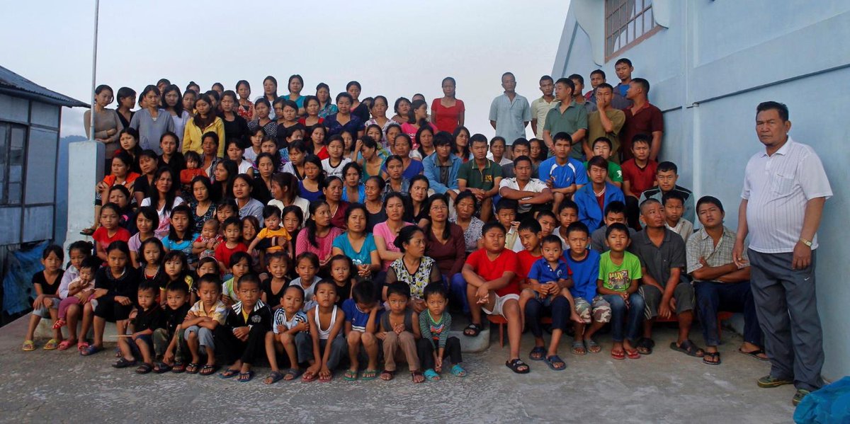 rapplerdotcom's tweet photo. WORLD'S LARGEST FAMILY 👪

LOOK: Family members of Ziona Chana (R) poses for group photograph outside their residence in Mizoram, India on October 7, 2011.

Chana, the head of a local Christian sect that allows polygamy, had 39 wives and 94 children. He died on Sunday, June 13. https://t.co/C4To4dtbB6