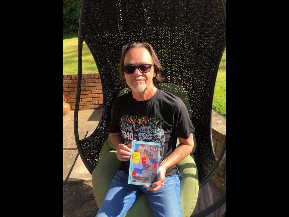disleyrascal's tweet photo. UB40's drummer Jimmy Brown with his copy of UB40 (A Legal Drug) by Tanya Kennedy - you can order the book from https://t.co/rlFEHA8FEb all proceeds go to St Margaret's hospice in Taunton. #newbook #UB40Superfan #autobiographical #greatstory @a_ub40 @beatnpress @KenDoddy2 https://t.co/Hu6VeiABZv