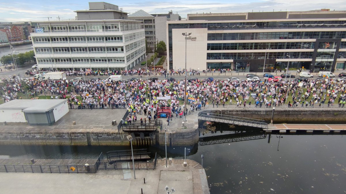 RedMediaIreland's tweet photo. Well done to the massive crowds gathering at the Convention Centre sitting of the Dáil to protest the #mica scandal #MicaProtest https://t.co/XvhqTZi2hR
