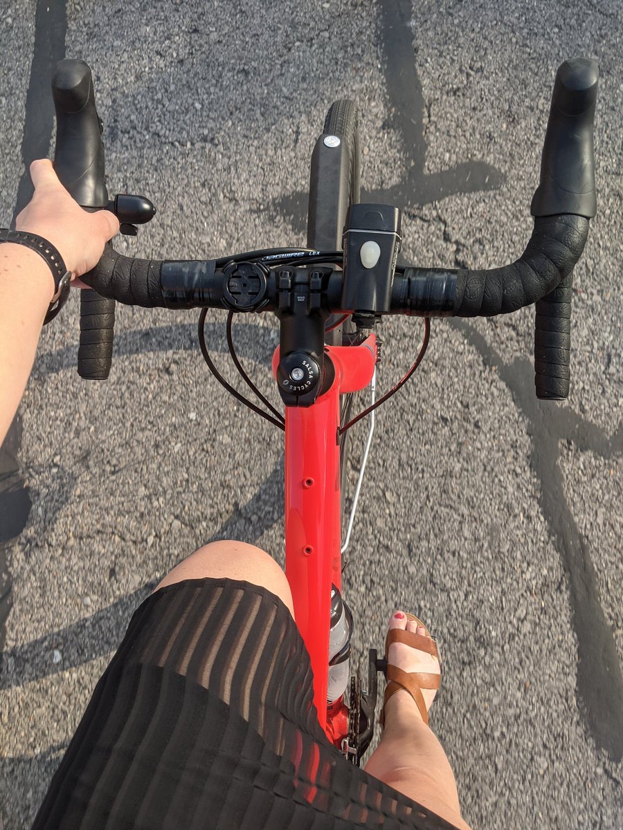 randimixdorf's tweet photo. Channeling my inner @MaggieBikesKC and the skills I learned in the @BikeWalkKC Women's Confident City Cycling class 4+ years ago: first bike commute in a dress and heels! #womenbikekc #bikekc #bikewalkkc https://t.co/zUN3ZftU5k