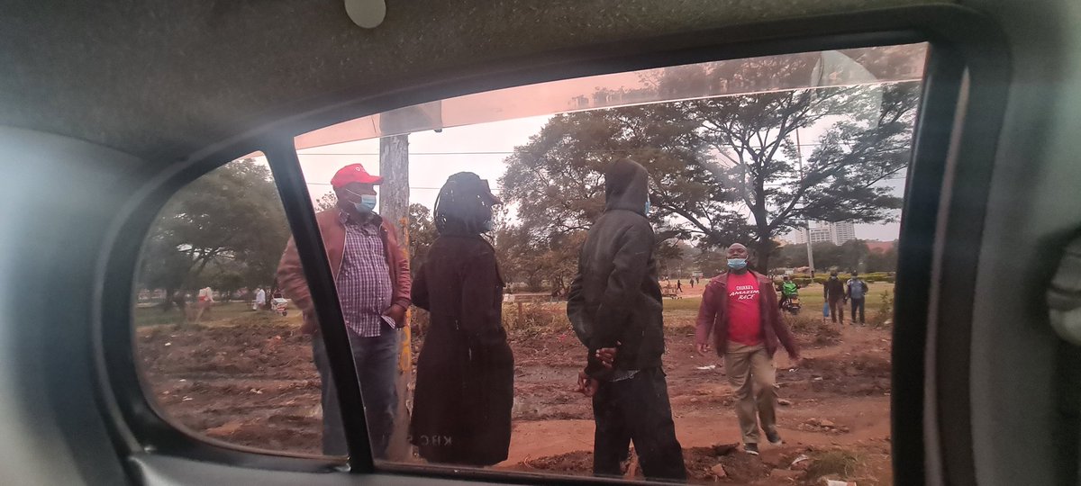 EssNgugi's tweet photo. @KenyanTraffic @DCI_Kenya happening on Uhuru Highway opposite Parliament this is an Uber Eats rider trying to make ends meet but being harrased by shameless hungry city council men and a woman. The guy seating on the motor bike has taken over the bike and wants to commandeer it. https://t.co/vb2qOXaN5Z