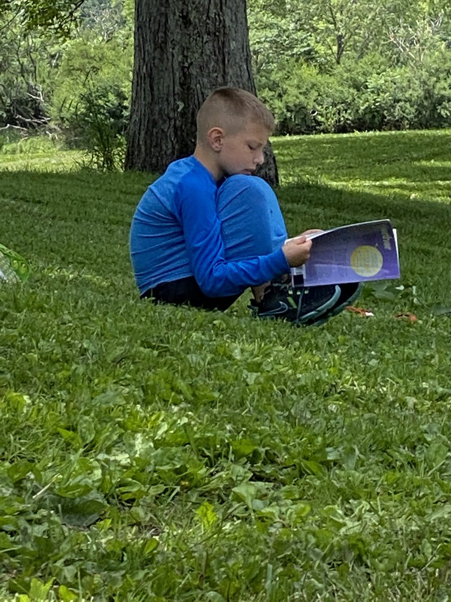 HmartMcIntosh's tweet photo. Was too nice of a day to not go outside and read. @OleanEastView https://t.co/dd5zCUarQm