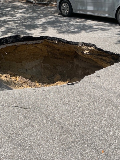 CharlestonPD's tweet photo. Due to the size and nature of the sinkhole, Coming Street at Bull Street will remain closed indefinitely until repairs are made. Barricades are being placed to keep pedestrians away from the hazard. 
#chsnews #chstrfc https://t.co/XMGQPLdDDG