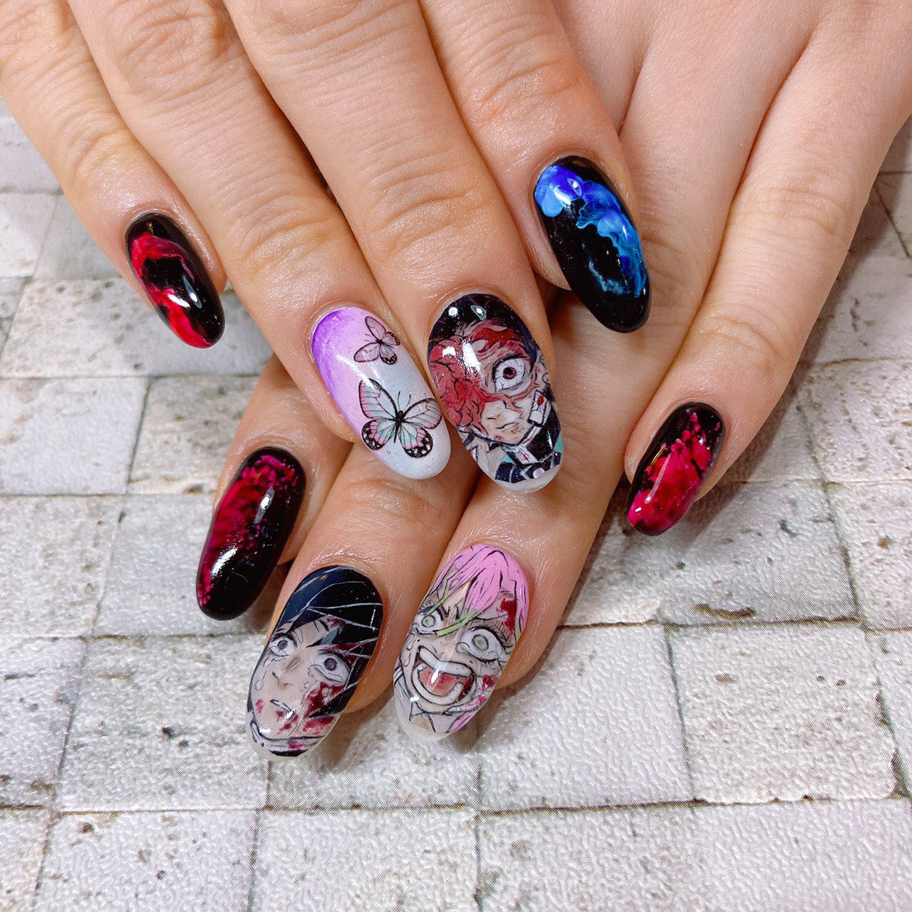 Nailchoupette 鬼滅 痛ネイル 他店様との合作 痛ネイルは描かせていただきました 最終決戦のシーン みんな痛々しい感じ ネイルにすると迫力ありますねぇ Nail ネイル 痛ネイル キャラクターネイル 手描きアート 鬼滅の刃 鬼滅の刃
