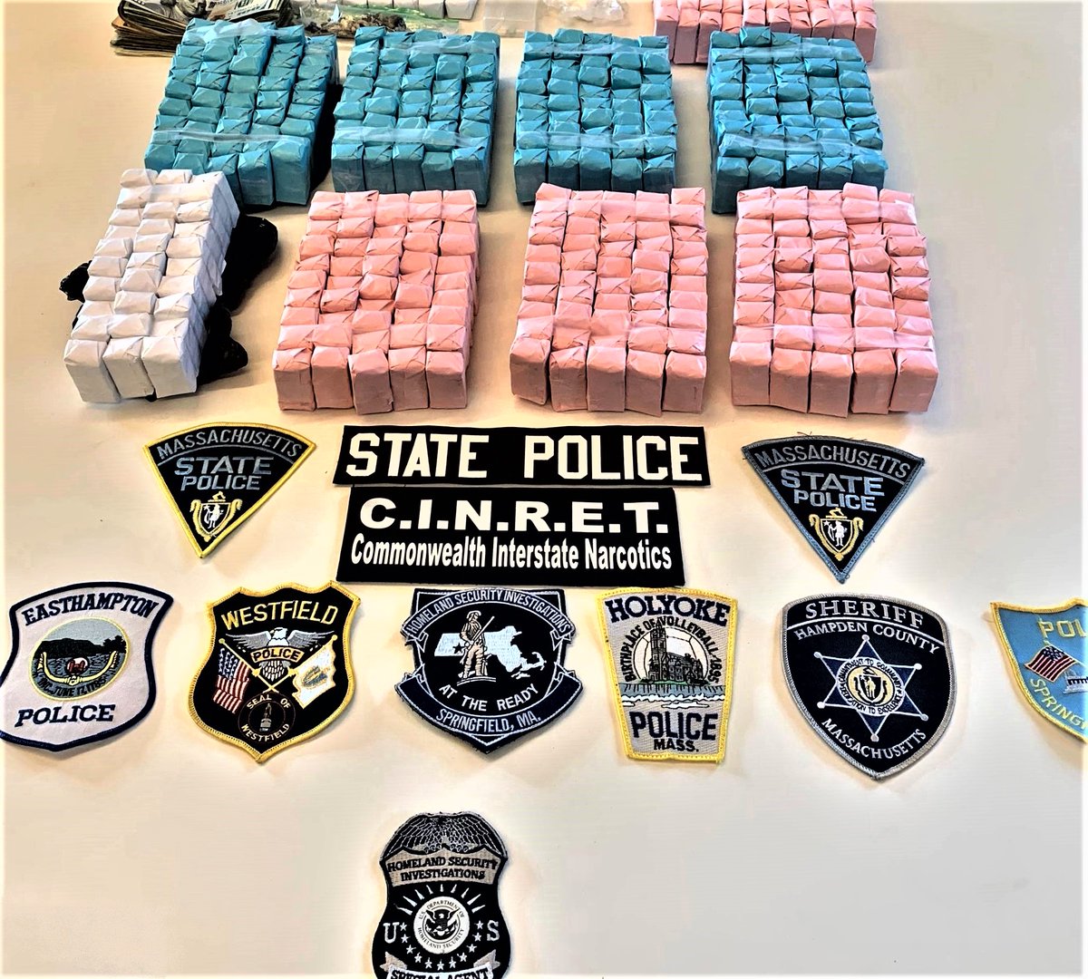 MassStatePolice's tweet photo. SEARCH WARRANT LEADS TO THE ARREST OF TWO MEN AND SEIZURE OF LARGE AMOUNT OF NARCOTICS https://t.co/q32ZUh10R2 via @MassStatePolice https://t.co/LTZG4CNm9s
