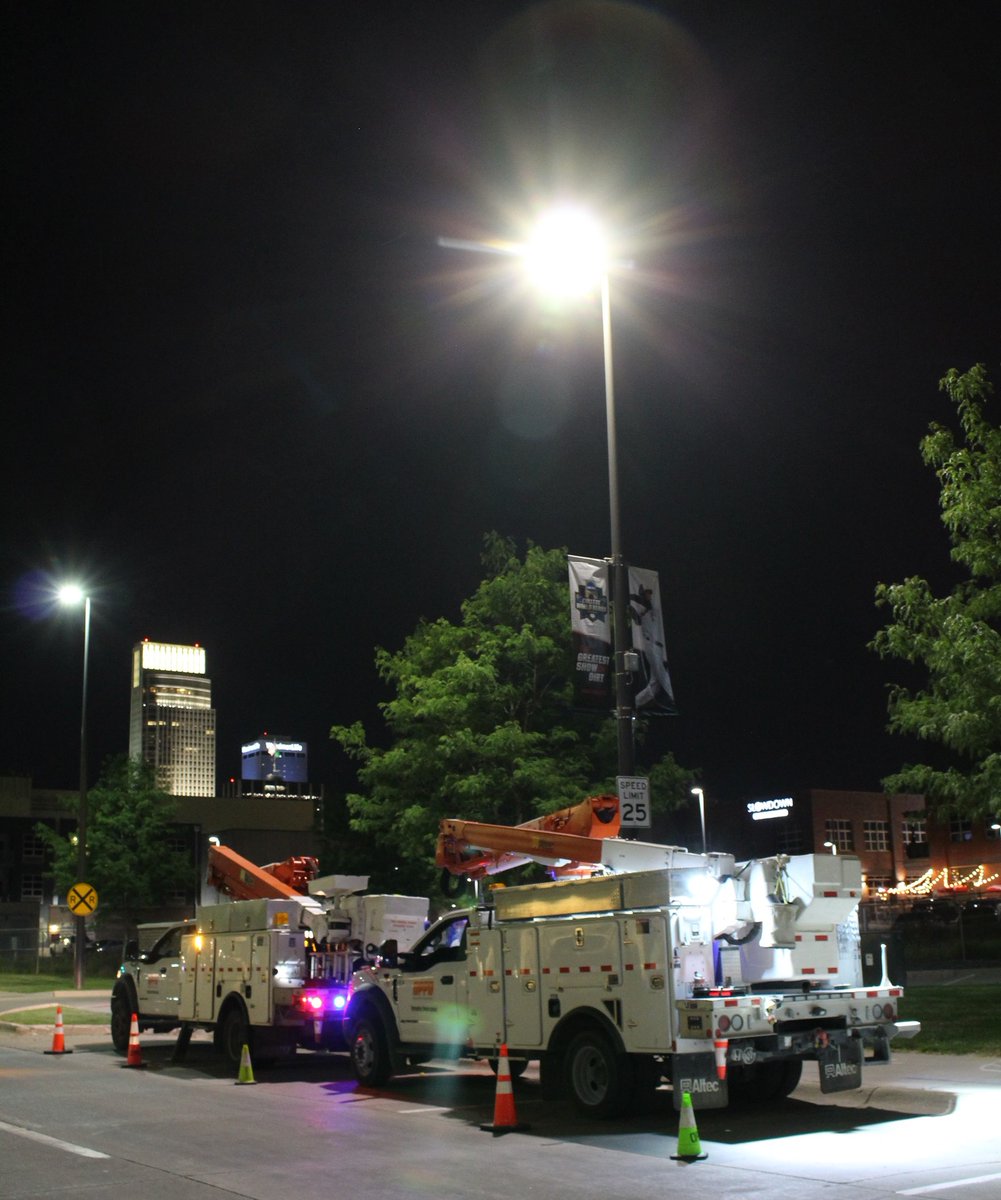 OPPDCares's tweet photo. POWERING THE CWS: In preparation for the College World Series, OPPD crews survey the downtown Omaha area inspecting and replacing streetlights. The streetlights that need maintenance are upgraded to new LED fixtures. https://t.co/bm2Sqa1KpZ