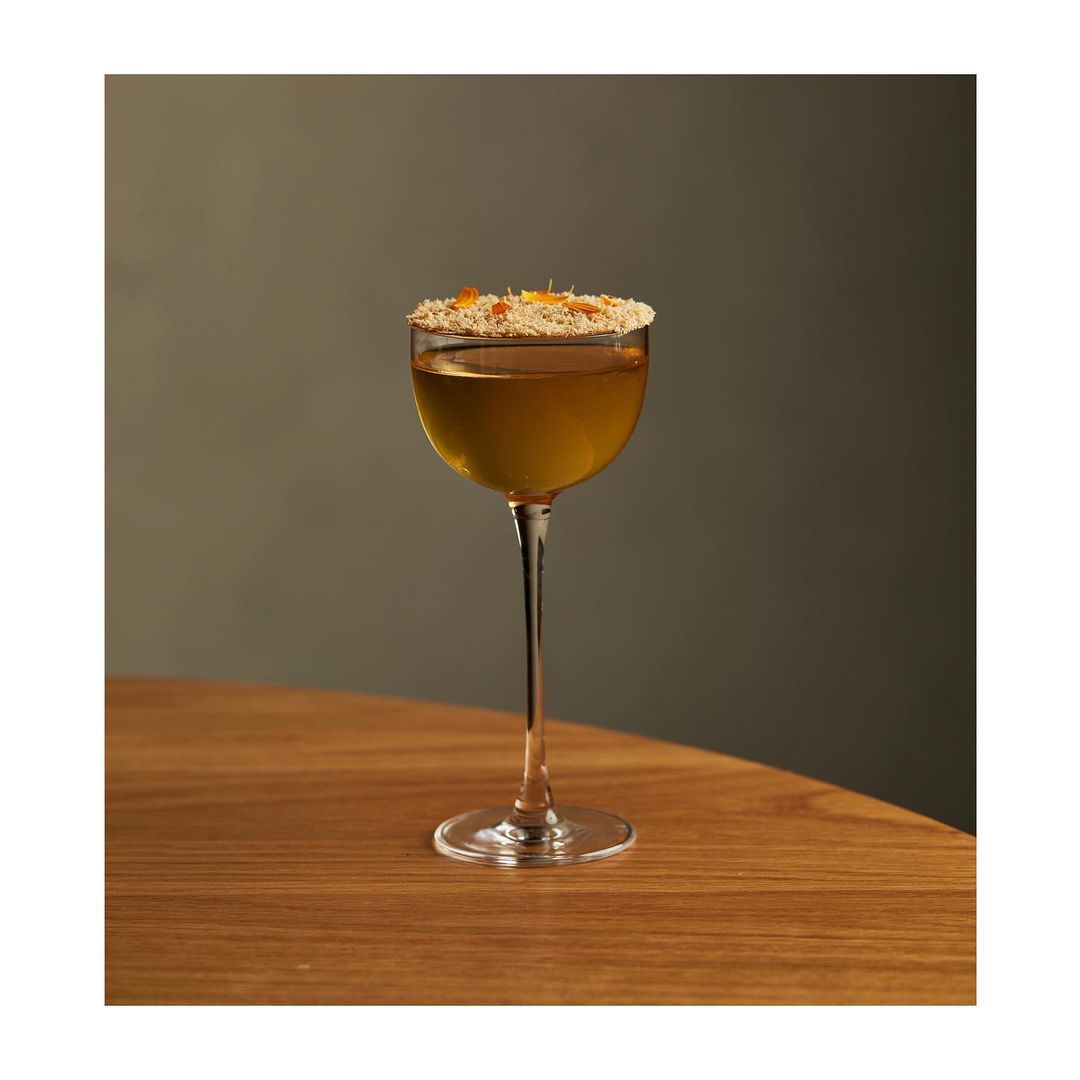 Autumnless by <a href="/byrdimelb/">B Y R D I</a> featuring our Starward Nova, Caramelised White Chocolate, Pineapple, Sake Lees, Peach and Marigold. A delectable weeknight digestif.