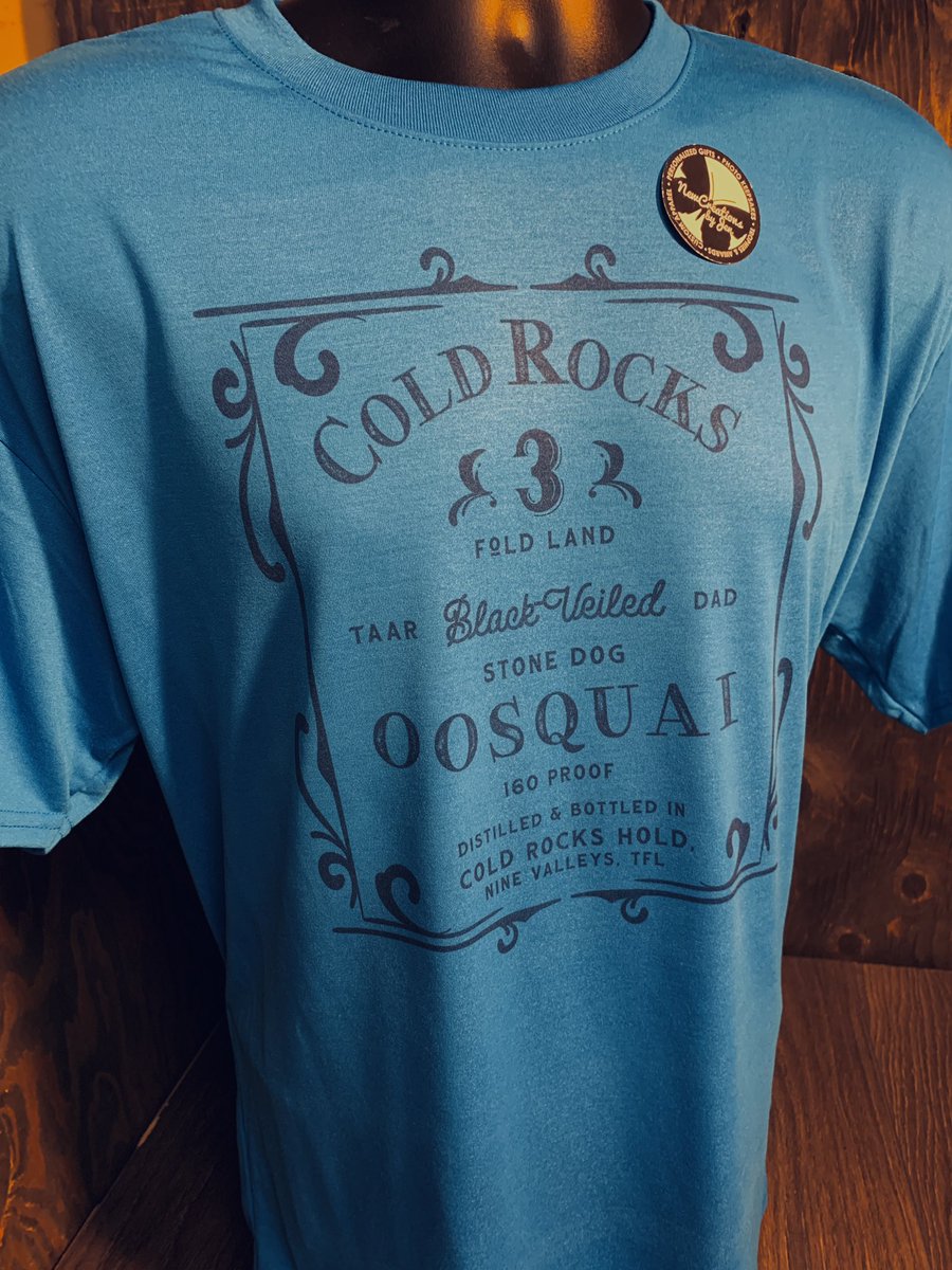 weeklywheelnews's tweet photo. Our new Cold Rocks Oosquai tee on Sapphire Blue! This color has much Ji… it’s worthy of a Water Seeker! #aielHumor #wheeloftime 🛒 https://t.co/NGlvTsd0yA https://t.co/m0FRi3Qjov