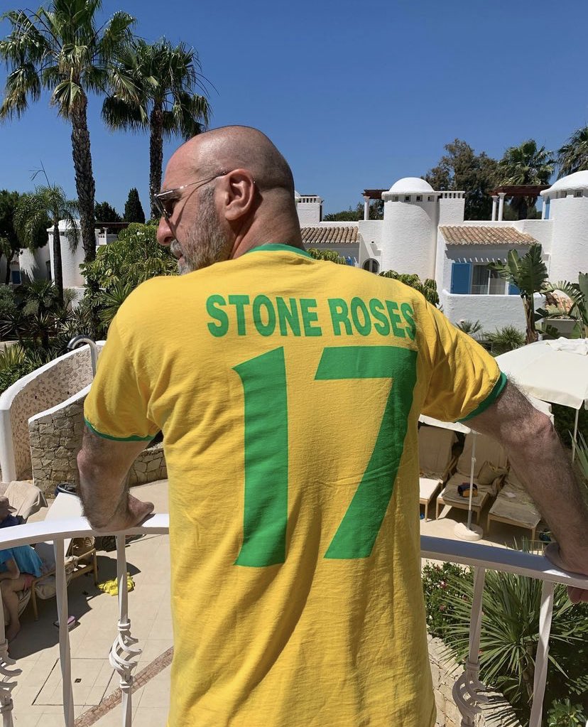 Eric Cantona wearing his Stone Roses tee today