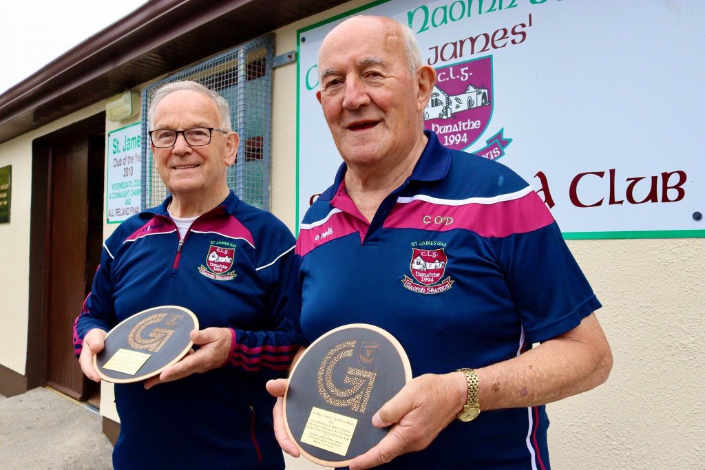 galway_st's tweet photo. Earlier today club stalwarts Con O'Donovan and Martin Crowley were presented with the Mayor's Award at Cumann Teach Pa Grealish. 

The Mayor of Galway @Mcubbard presented the duo with a plaque to mark their extraordinary service to the community over the years. https://t.co/i7eT1fBCVy