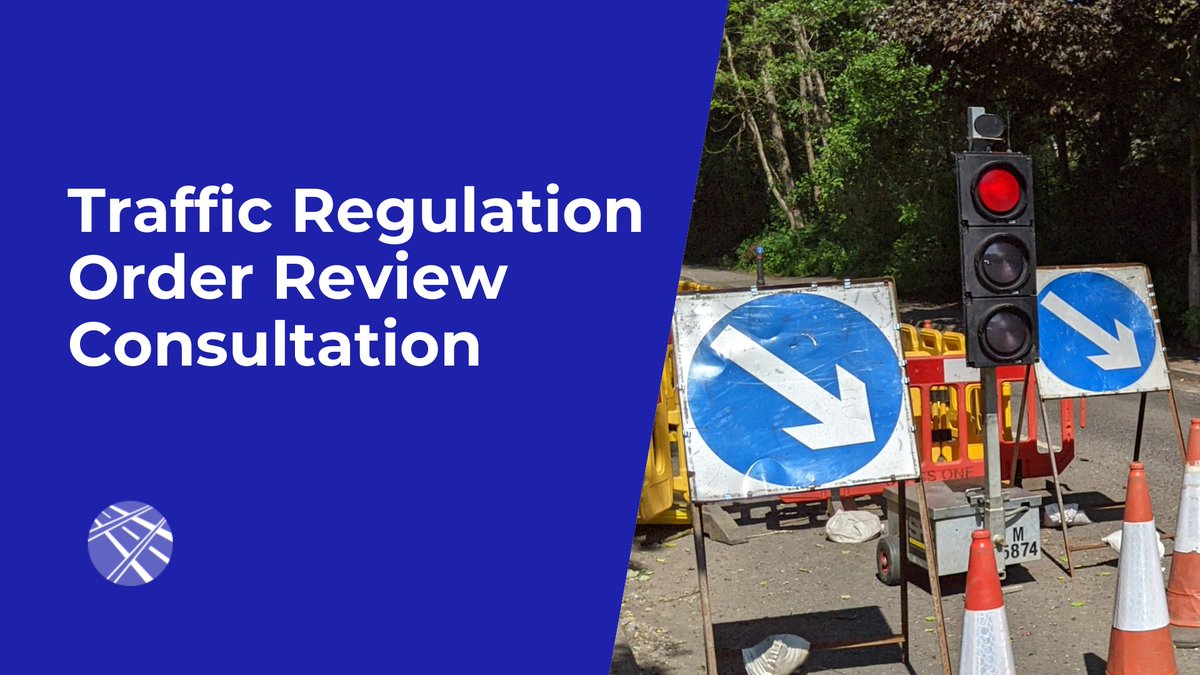 Temporary traffic lights and road signs on a local road. Caption: 'Traffic Regulation Order Review Consultation.'