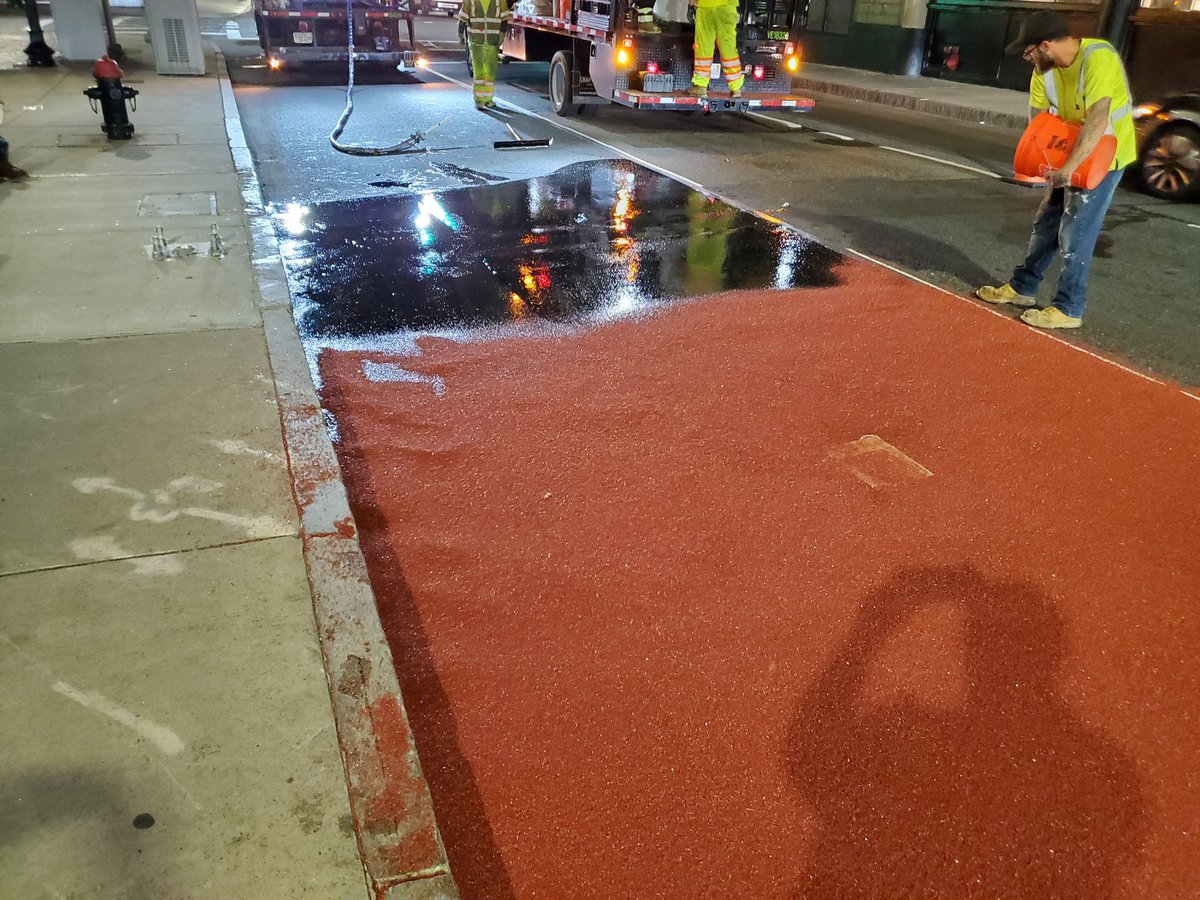 BostonBTD's tweet photo. Essex street Bus/Bike lane looking good. Got to love the ruby red that is put down by hand. Crews work hard overnight to get jobs like this done.
#teamBTD #KeepingBostonMoving https://t.co/nUPWAIJF7F