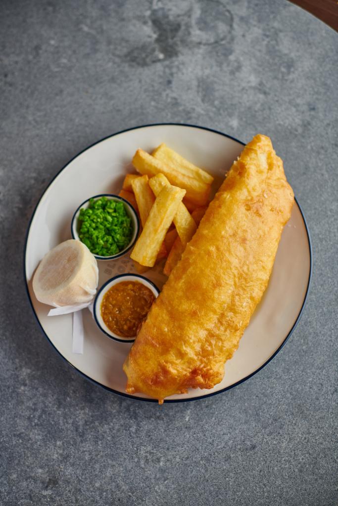 Happy #NationalFishAndChipsday! The perfect excuse (not that you need one) to come and try our delicious beer battered Cornish Cod, served with thick cut chips, crushed peas and chip shop curry sauce. It doesn't get more British than that! #fishandchips #britishfood