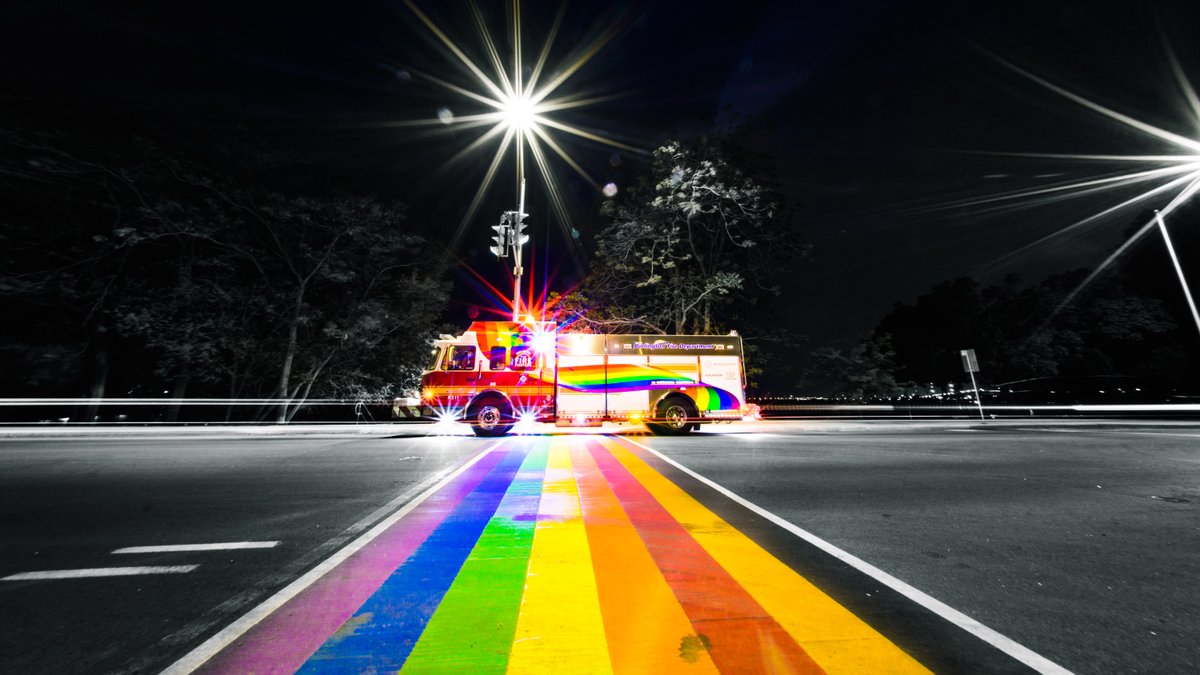 BurlingtonFire's tweet photo. Loving these night shots by @A_deben1 of the new @IAFF1552 #BurlFire graphic-wrapped truck in support of #Pride2021 and creating safe, inclusive spaces and workplaces for the LGBTQ+ community @cityburlington @BFDFireChief https://t.co/TQPFreSgKK