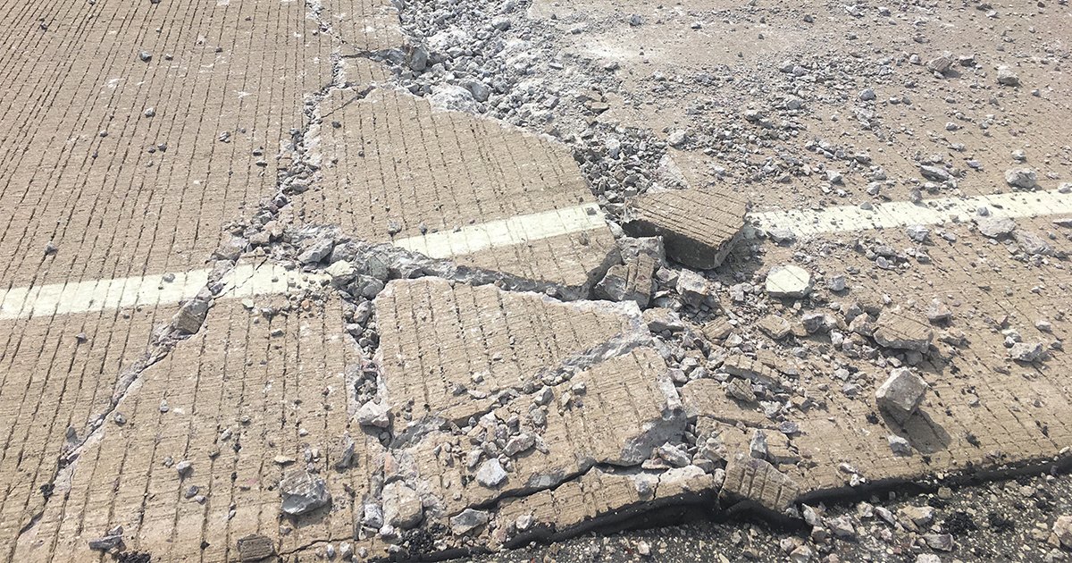 WisconsinDOT's tweet photo. It's hot out there! Continue to be alert for potential pavement buckles. #MoveOver or #SlowDown if you see highway crews making pavement repairs. #wiwx https://t.co/avYomRib6s