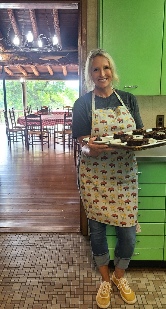 This super cute bison/floral print apron received the stamp of approval from the lodge cook and is available for purchase in our gift shop! 
#lodgekitchen #chefapproved