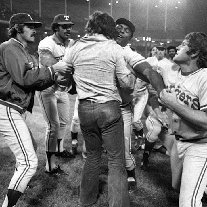 StatsCentre's tweet photo. On this day in 1974, "Ten Cent Beer Night" causes a game between the @Indians &amp; @Rangers at Cleveland Stadium to be forfeited to TEX while tied at 5 in the 9th inning due to a heavily intoxicated crowd (of 25,134 that consumed approximately 60,000 cups of brew) storming the field https://t.co/ZcXs1uOcl5