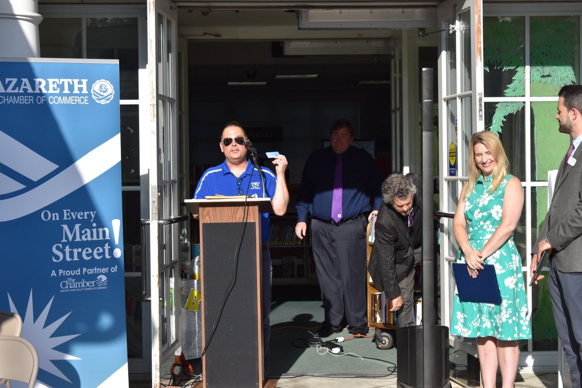 NorthamptonExec's tweet photo. Lamont McClure attended the ribbon cutting celebrating the 70 anniversary of the Nazareth Memorial Library and presented a Proclamation to Director Holly Bennett. Nazareth Mayor Lance Colondo also spoke and proudly showed off his library card. https://t.co/sJzYEQ0b7z