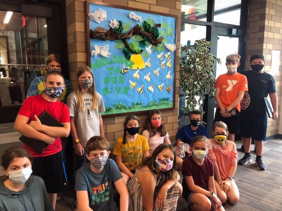 springcreekhawk's tweet image. Fifth Grade Friends and their final Caring Campaign.  Our parting gift for SCE was a welcome bulletin board to all who enter SCE over the summer and next year! Chock full of “Bee puns” and bright colors!