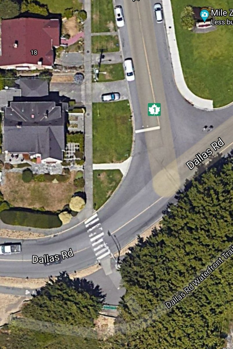 yyjObserver's tweet image. Let's look at #yyj @BeaconSave at #MileZero.  Please notice the straight line of the border. That is the @CityOfVictoria sidewalk along Douglas Street which is part of the park. The satellite image shows the driveway extensions that are part of the park as well.