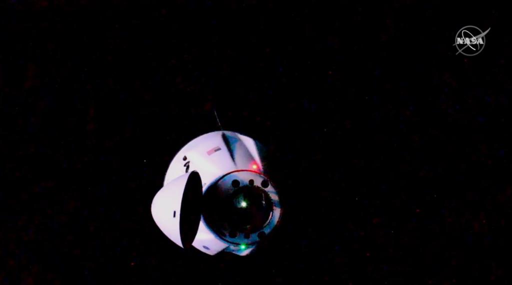 Dragon cargo spacecraft approaches for docking