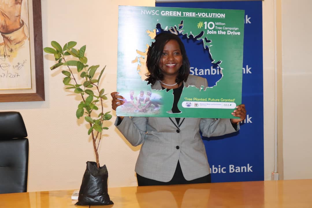 PHOTOS:
General Manager Kampala Water <a href="/NWSCKampalaGM/">Mahmood Lutaaya</a> handing over a tree seedling to <a href="/stanbicug/">Stanbic Bank Uganda</a> CEO Anne Juuko. Be part of the  #NWSCTreeVolution #ATree4EveryCustomer campaign. Plant a tree and save the future. <a href="/NWSCMD/">Dr. Silver Mugisha</a>