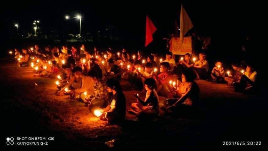 LMoonkha's tweet photo. Candle light strike of Kanyone village, Launglone in defiance of the junta coup. #LessTalkMoreActionsASEAN  #June5Coup  #WhatsHappeningInMyanmar https://t.co/ddQPjnfOtp